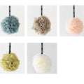 Mesh Pouf is a soap-insert loofah that creates rich lather and gently cleanses the skin, leaving it soft and refreshed.